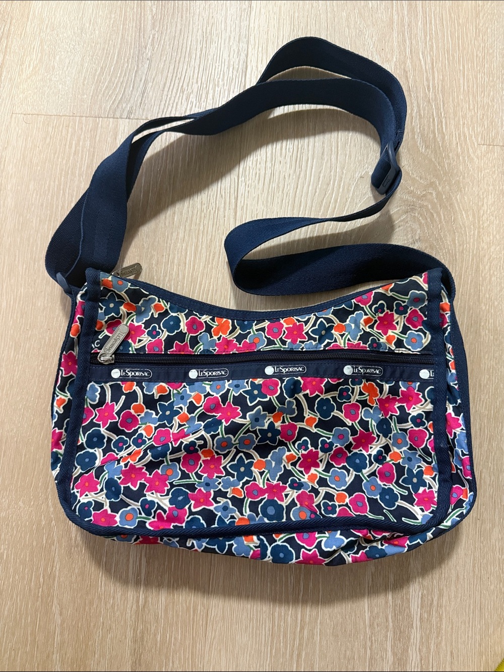 LeSportsac Navy Floral Crossbody with Pink and Orange Accents